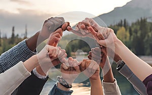 Heartwarming wallpaper with hands forming a support network symbol