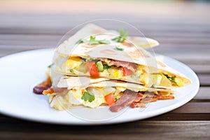 hearty breakfast quesadilla with egg and bacon