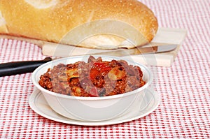 Hearty Chili With Loaf Of Bread