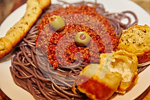 Hearty Italian Spaghetti with Garlic Bread and Breadstick Close-Up