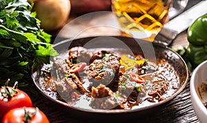 Hearty slow cooked goulash meal in a pan