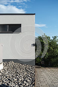 heat pump in a new building area with modern house facades