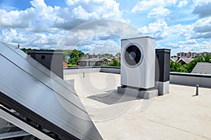 Heat pump and solar collector on the roof