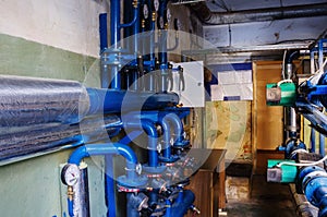 Heat-regulating equipment in the basement of a heated building