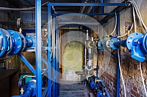 Heat-regulating equipment in the basement of a heated building