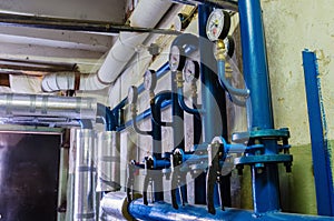 Heat-regulating equipment in the basement of a heated building