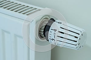 Heat regulator on a heater, close up picture. Heating Costs