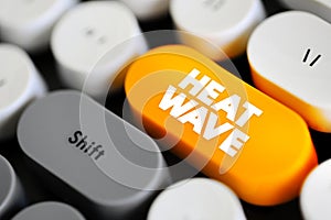 Heat Wave is a period of excessively hot weather, text concept button on keyboard