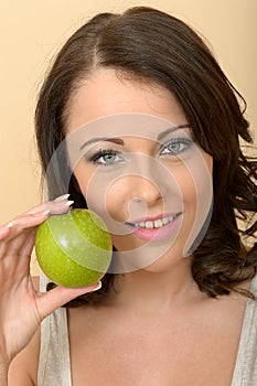 Heathy Young Woman Holding Fresh Ripe Juicy Green Apple