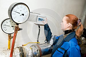 Heating engineer in boiler room