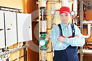 Heating engineer repairman in boiler room