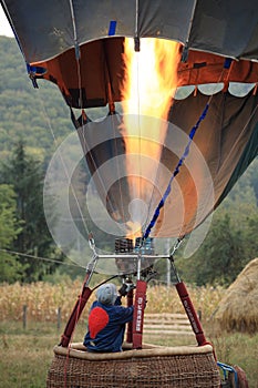 Heating the hot air balloon before lifting off