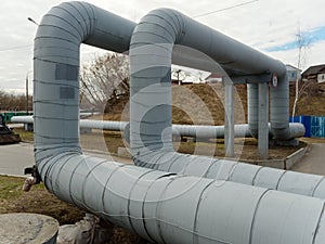 Heating main. large diameter pipes are sharply curved photo