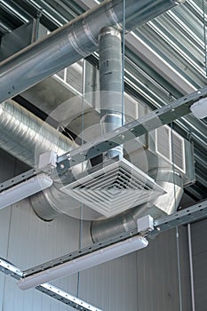 Heating pipe system in the warehouse of the enterprise. ceiling ventilation system