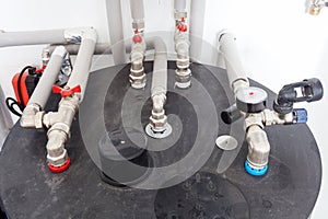 Heating pipelines and temperature indicators in boiler room.