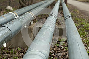 Heating pipes in the city. Stainless steel on city communications