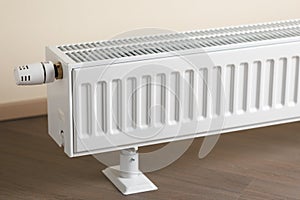 Heating radiator with thermostatic knob in the living room