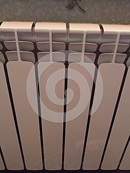 Heating radiators. Bimetal heating radiators. Heating season. Replacing the radiator with a new one.