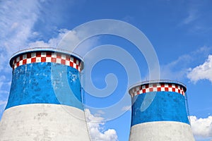 The heating stations gratings are painted blue and red and white checkered against the blue sky