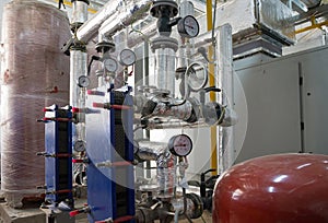 Heating system boiler room equipments. Boilers, pressure gauges and pipes