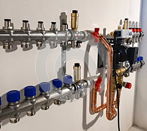 Heating system with copper pipes, valves and other equipment in a boiler room. copper pipes engineering