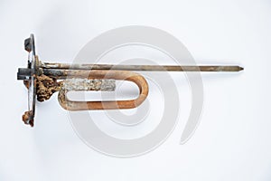 heating ten from a water heater after 8 years of operation broken on a white background, replacing an old ten from a