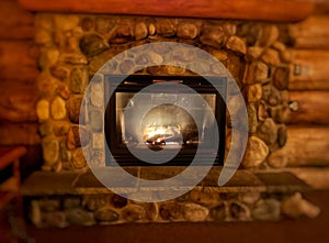 Heating , warmth, fire and cosiness concept . closeup of burning  fireplace at home - image