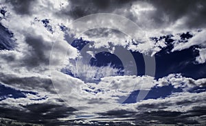 Light in the Dark and Dramatic Storm Clouds