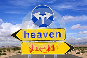 Heaven and hell road sign warning