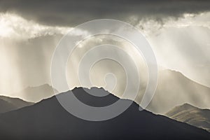 Heavenly light over dramatic mountains in Tasmania, Australia