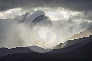 Heavenly light over dramatic mountains in Tasmania, Australia