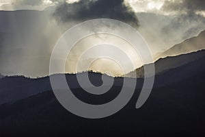 Heavenly light over dramatic mountains in Tasmania, Australia