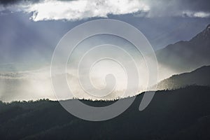 Heavenly light over dramatic mountains in Tasmania, Australia