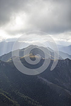 Heavenly light over dramatic mountains in Tasmania, Australia