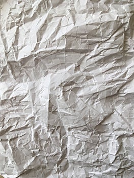 Heavily wrinkled, vintage, yellowed paper. Abstraction. Retro.