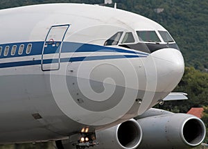 Heavy airplane is taxiing photo