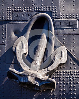 A heavy anchor holds a ship in one place.