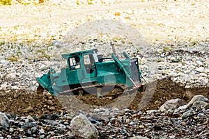 Heavy bulldozer working at the limestone quarry. Mining industry
