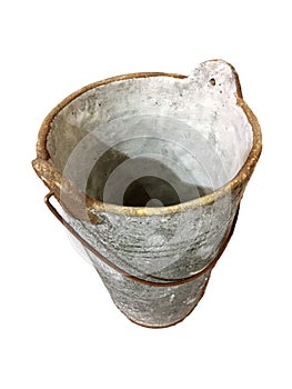 A heavy cement pot with rusty handle