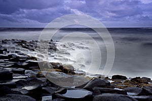 Heavy cloud on the Giant's causeway photo