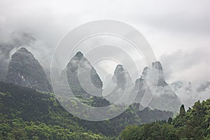 Heavy clouds covering the hills bordering the Li River