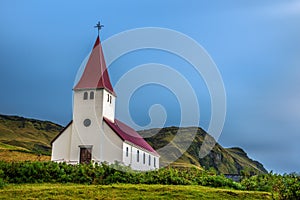 Heavy clouds over the lutheran church in Vik, Iceland