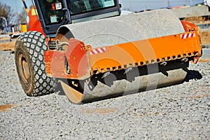 Heavy compactor roller at road work