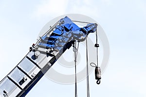 Heavy construction blue crane for heavy liftin photo