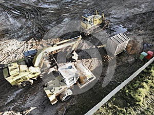 Heavy construction equipment for earthworks. Road renewal process, construction work. view from above. drone photography