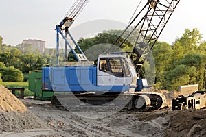 Heavy crawler crane at the construction site for the of road transport interchanges in Moscow