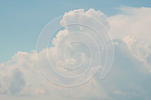 Heavy and dense cumulonimbus cloud is beautiful and soft blue sky