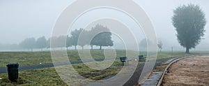 Heavy dense fog at a park