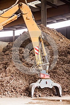 Heavy duty excavator doing earth moving