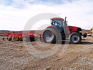 Heavy duty farm equipement at work site